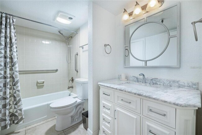 Building Photo - 5950 Pelican Bay Plaza S