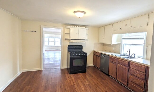 Building Photo - 1343 E. Broadway. House with basement and ...