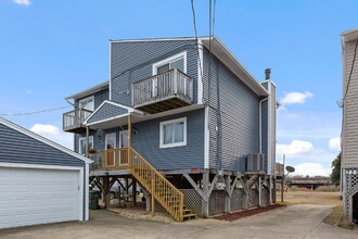 Building Photo - Beachside Living with Beautiful Water Views