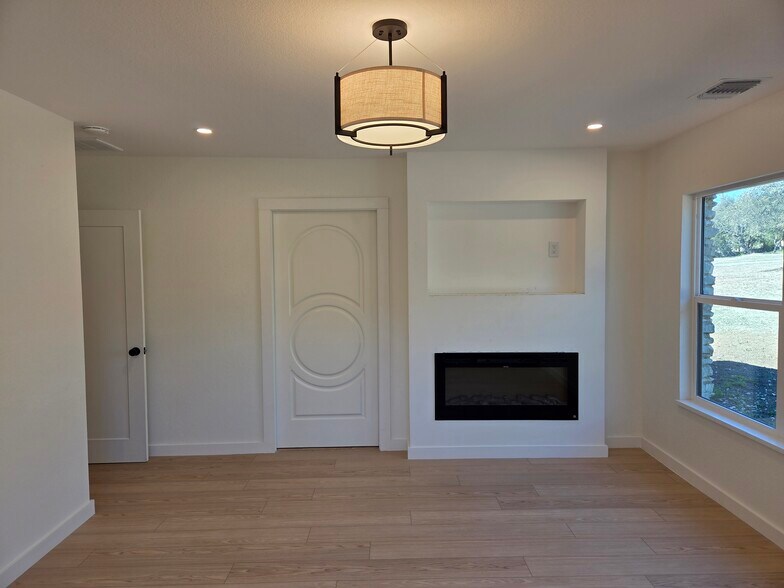 Primary Bedroom Fireplace - 10717 Deer Canyon Rd