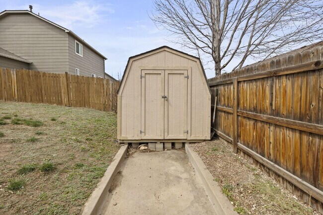Building Photo - Spacious 4-Bedroom Home with Fenced Yard, 2-Car Garage & Scenic Views in Cheyenne Meadows