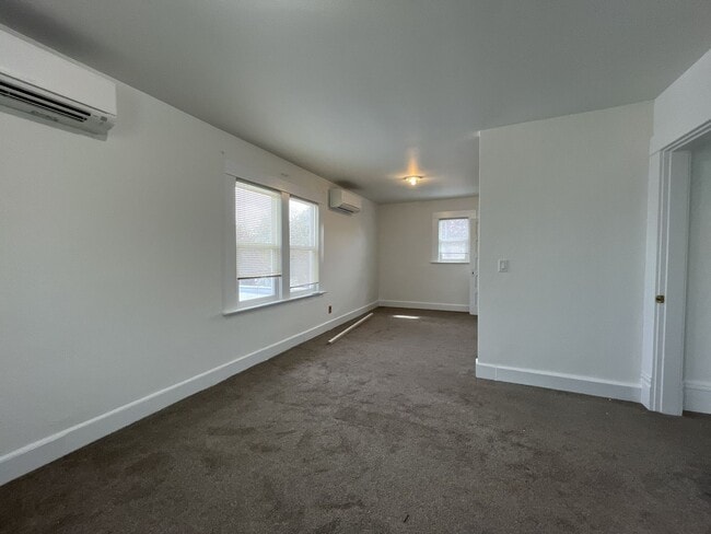 Building Photo - Expansive 4BR 2,900+ Sq Ft Home with Theater-Style Living Room & Bonus Hobby Workshop