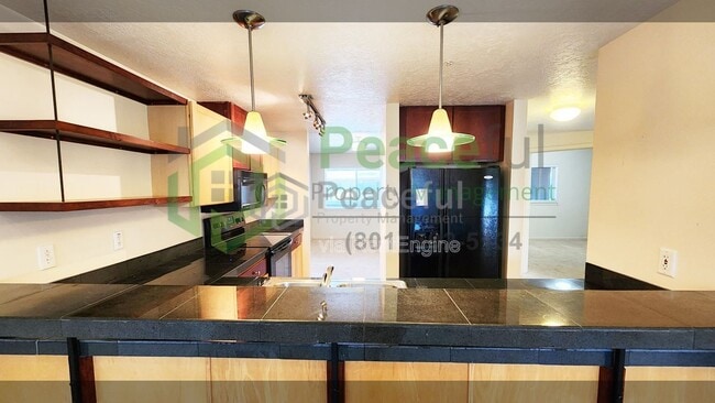 Building Photo - 4340 S Highland Dr