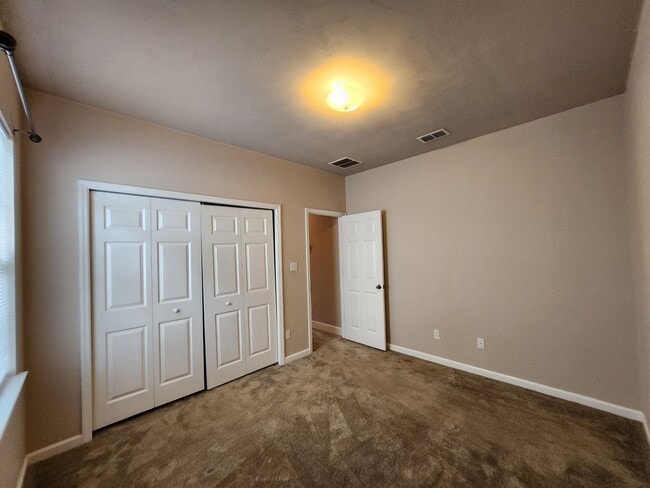 Building Photo - 3/2 townhome available for rent August 6, 2026, renting for $1795 per month, privacy fenced back ...