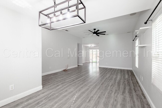 Building Photo - 3 Bedroom/2 Bath with a Pool and Solar - $...