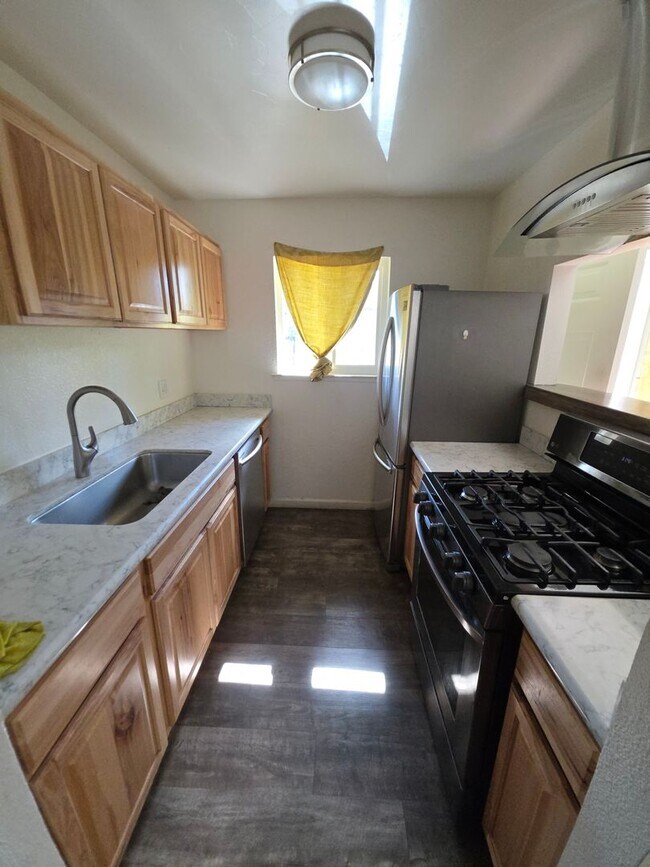 Building Photo - Welcome home to this beautifully updated 2-bedroom, 1-bath upstairs condo in a peaceful Auburn ne...