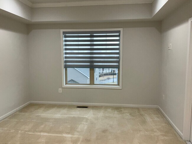 Building Photo - Beautiful 4BR 3.5BA 3 level townhome with 2 car attached garage located in the Cabin Branch Commu...