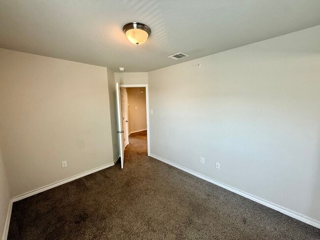 Building Photo - 8331 Breezy Cv