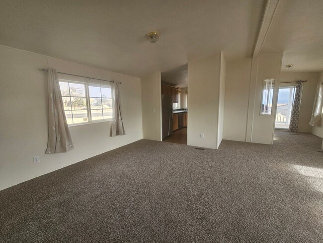 Building Photo - Like New 3 Bedroom On Acre Plus in Moundhouse