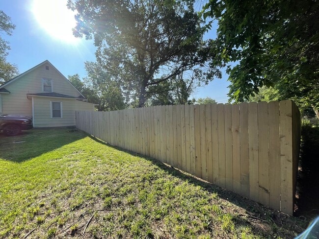 Building Photo - New Appliances + HUGE Fenced Backyard