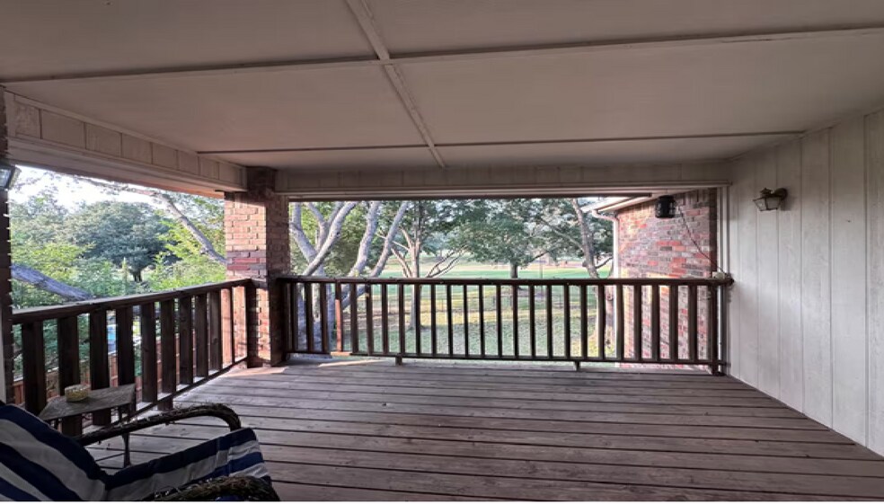 An elegant private terrace off the primary suite offers a serene elevated retreat - 10913 Alexandria Dr