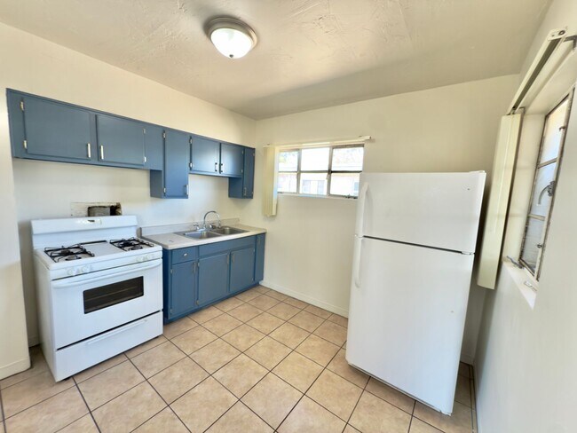 Building Photo - Two Bedroom w/ A/C, Yard and Carport