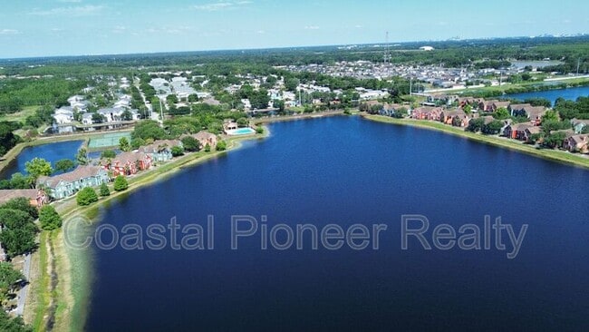 Building Photo - 9068 Lake Chase Island Way