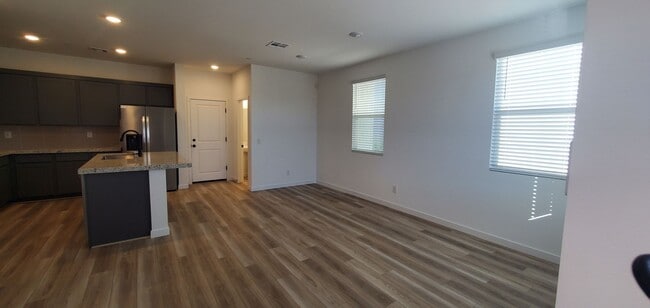 Building Photo - Beautifully designed modern townhome with attached garage.
