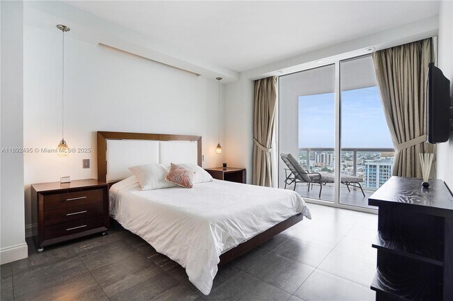 Building Photo - 6365 Collins Ave