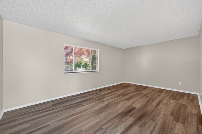 Building Photo - For Rent: Charming 4-Bedroom Tri-Level in ...
