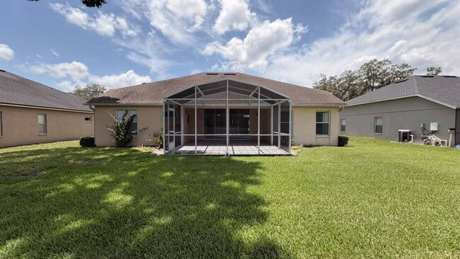 Building Photo - "Stunning 4-Bedroom Lake View Home in Oviedo – Spacious 2,132 Sq Ft Retreat!"