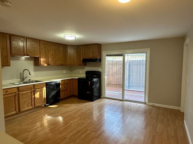 Building Photo - Spacious & Stylish 3BD Home with Iconic Stone Fireplace + Soaking Tub