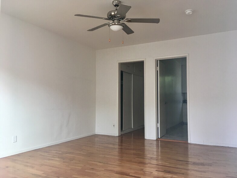 spacious, separate areas for kitchen, storage, and bathroom - 1318 N Martel Ave