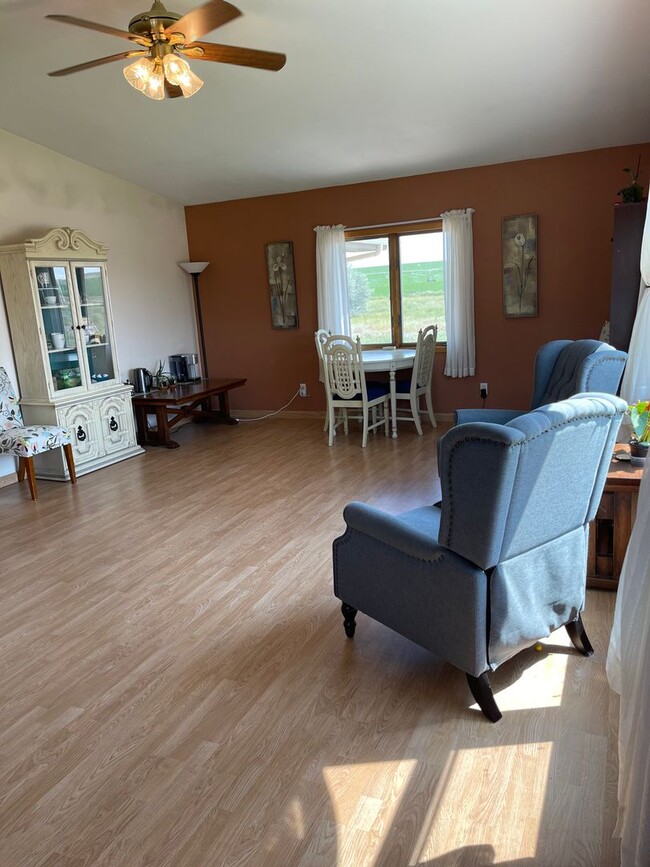 Building Photo - Spacious, four-bedroom, two-bathroom, coun...