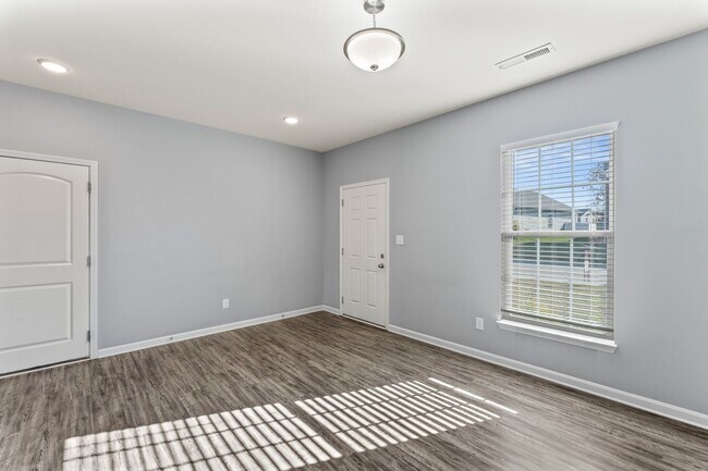 Building Photo - Stunning 4-Bedroom Home with Serene Pond Views