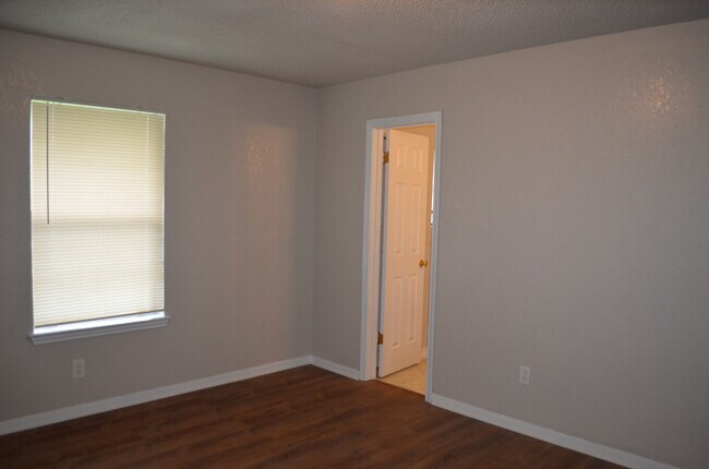 Building Photo - This 3 Bedroom Home with Fireplace is a must see!