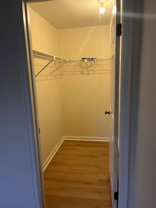 Master bedroom walk-in closet - 9908 Whitney Cir