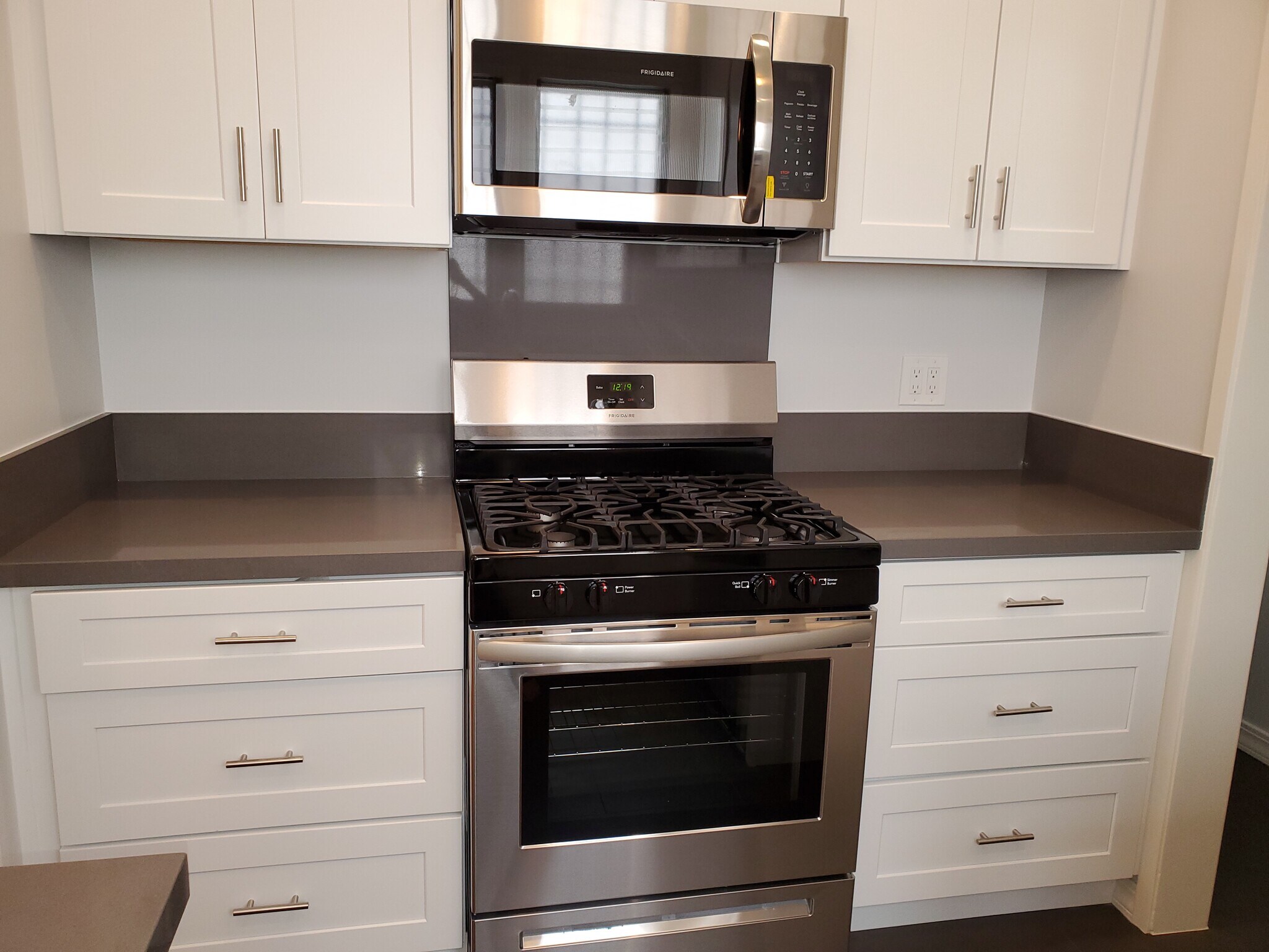 GAS STOVE AND MICROWAVE - 6326 Orange St