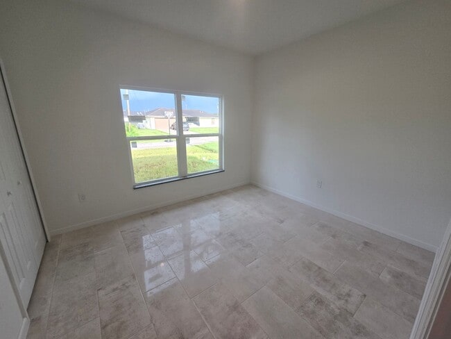 Building Photo - Brand New 2/2/1- SW Lehigh Acres