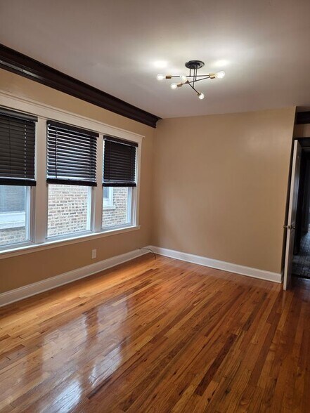 Building Photo - 7834 S Langley Ave