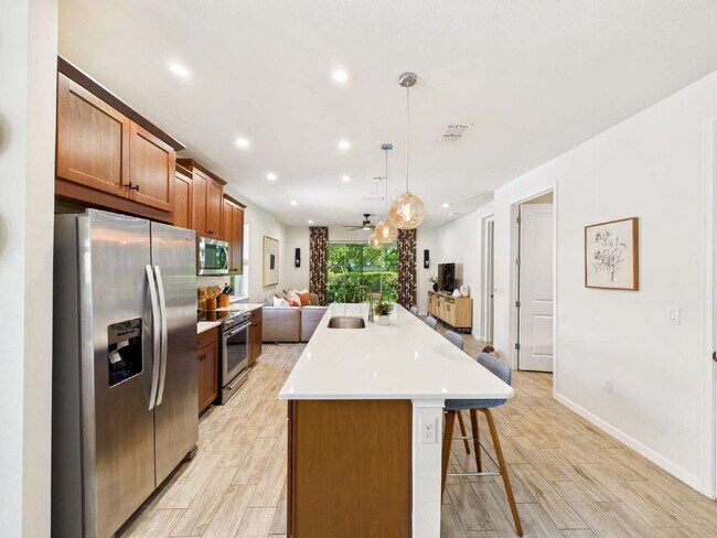 Building Photo - Relax and Unwind in This Beautiful Arboretum Condo Near Downtown Naples – 3-Month Minimum Rental