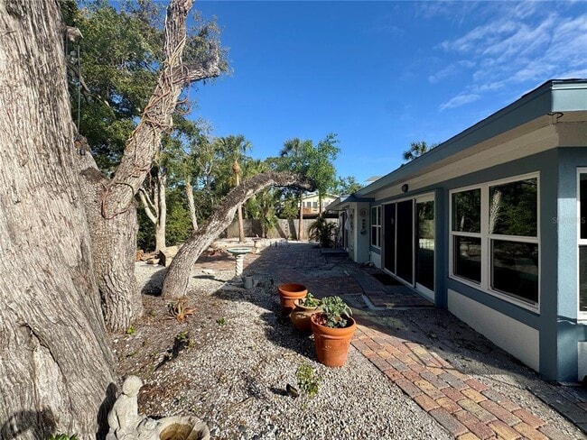 Building Photo - 7372 Melaleuca Way