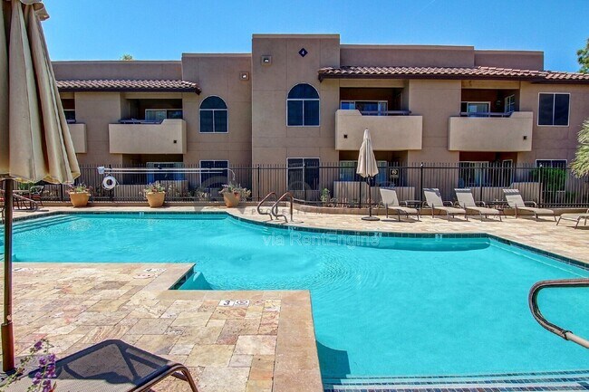 Building Photo - 9451 E Becker Ln