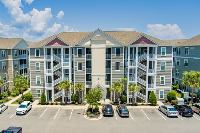 Building Photo - The Villages at Queens Harbour II