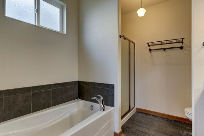 Building Photo - Spacious 3 Bedroom Plus Office with AC, Gas Fireplace and Fenced Backyard