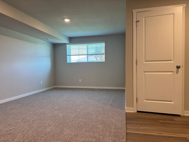 Building Photo - Spacious 4-Bedroom Split-Level Near Standing Bear Lake & Trails