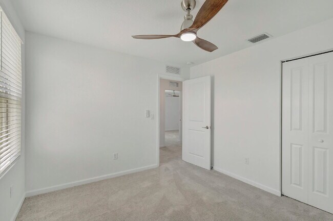 Building Photo - Luxurious Living: Spacious 5-Bedroom Home with Scenic Views in Port Saint Lucie!