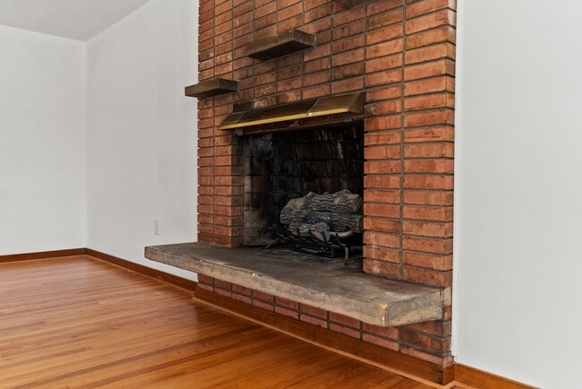 Building Photo - Large 4-Bed Brick Rancher with 2-Car Attached Garage!