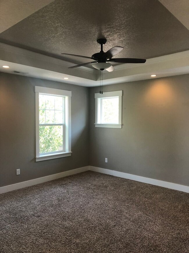 Building Photo - Beautiful New Home with Garage and Yard! A...