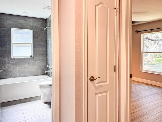 Building Photo - LAKE FRONT BRAND NEW Beautiful 3 bedroom on Lake Toho!