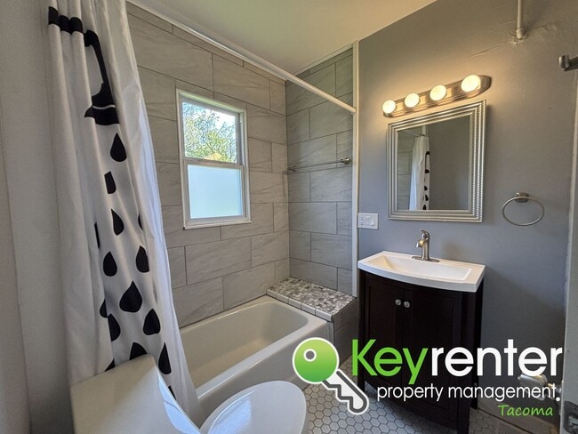 Building Photo - Timeless Charm Meets Modern Living in This...
