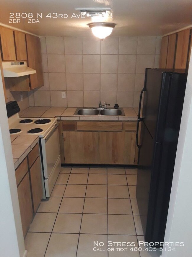Building Photo - 2 Bed Condo at 43rd Ave and Thomas!