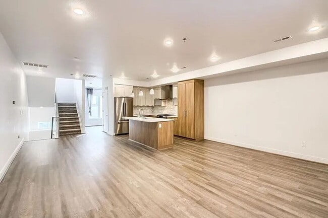 Building Photo - Modern LoHi Living with Rooftop Deck & City Views!!