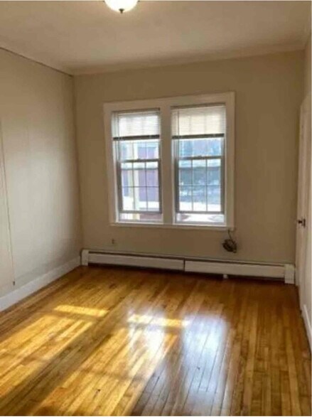 Building Photo - 63 Highland St