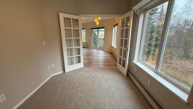 Building Photo - Major Updates! Raised Ranch Style Condo wi...