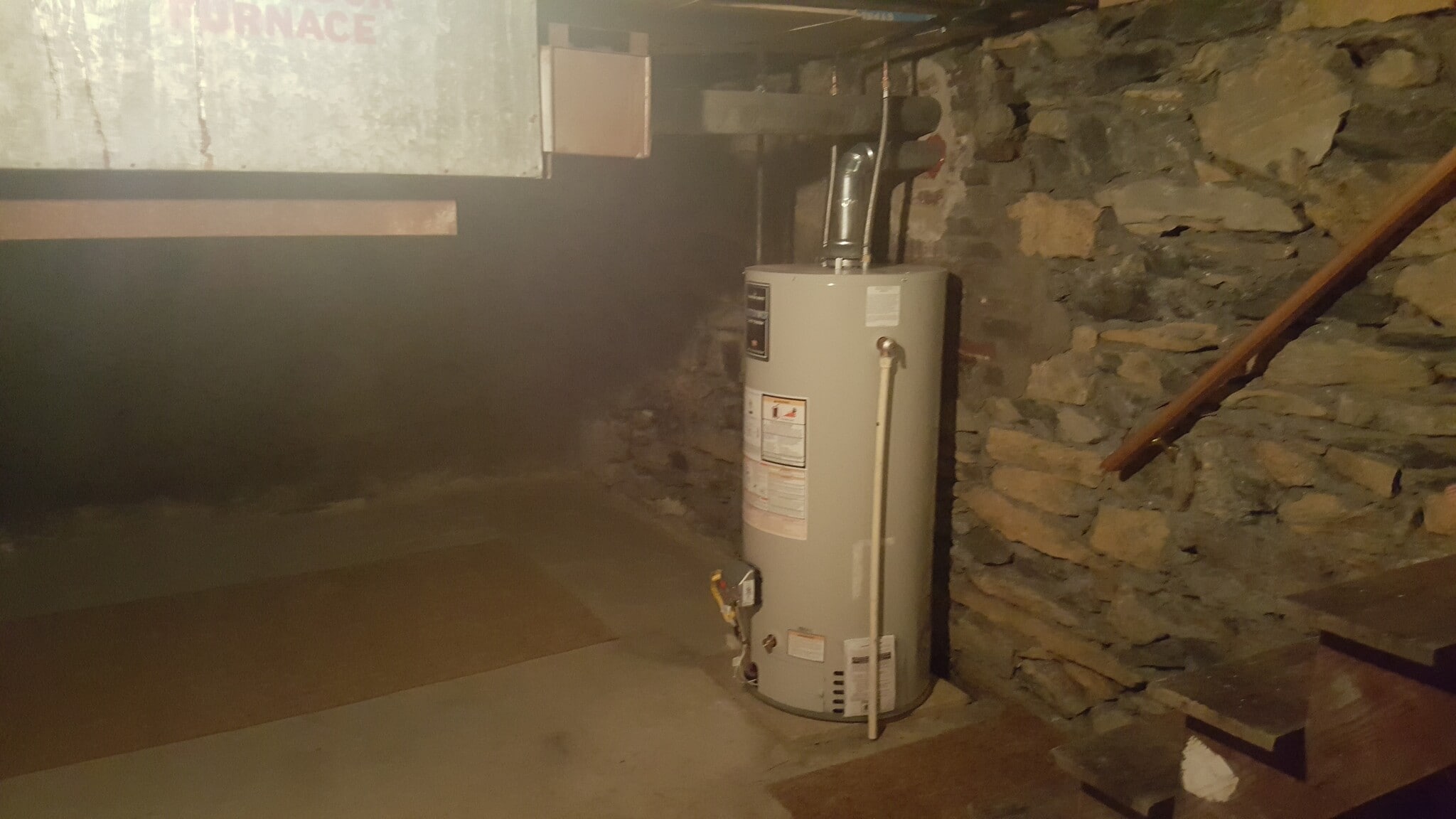 BASEMENT AND FAIRLY NEW HOT WATER HEATER - 526 Pearl St