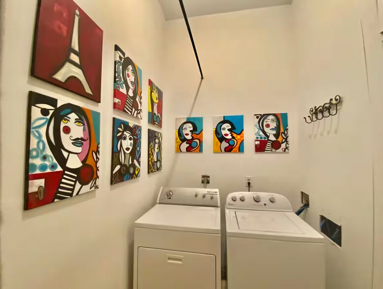 shared laundry room in common hallway with just one tenant - 117 W Harrison Ave