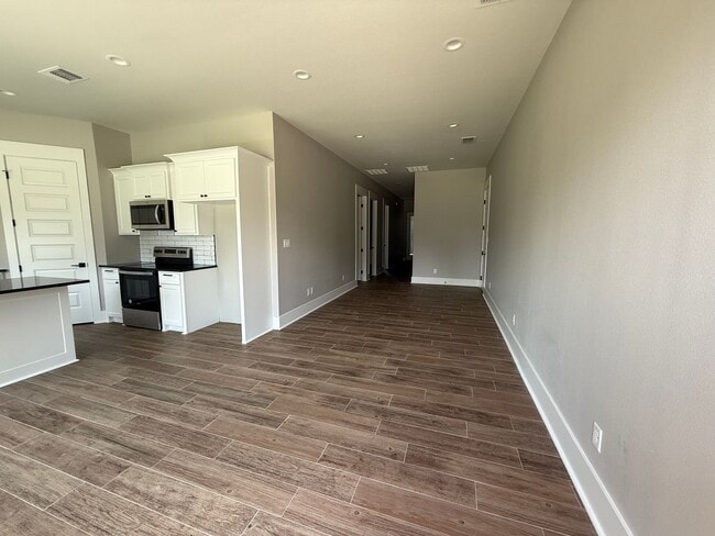 Building Photo - 3/2/1 NEW CONSTRUCTION LISD fenced yard an...