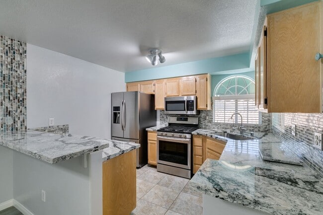 Building Photo - Updated 2-Bedroom Condo with Fireplace