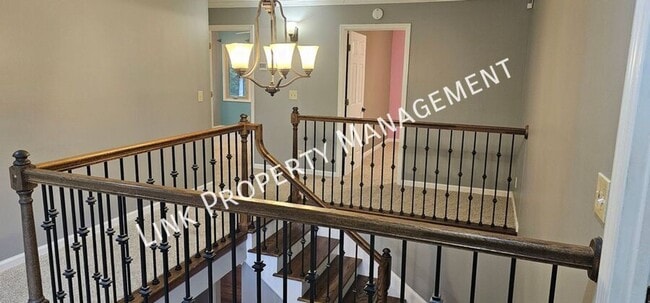 Building Photo - Exceptional 5-Bedroom Home with Luxury Out...